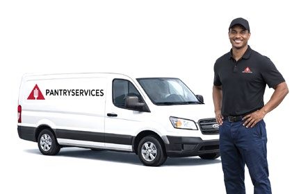 A Pantry Services delivery van with a uniformed driver.